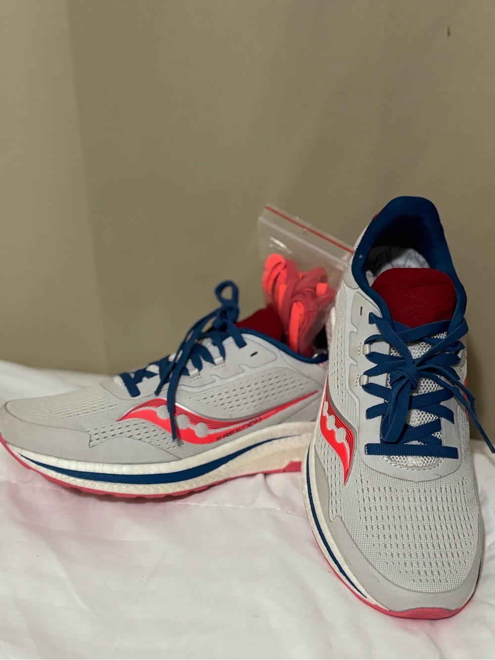 Saucony White & Blue Running Shoes with Pink Accents